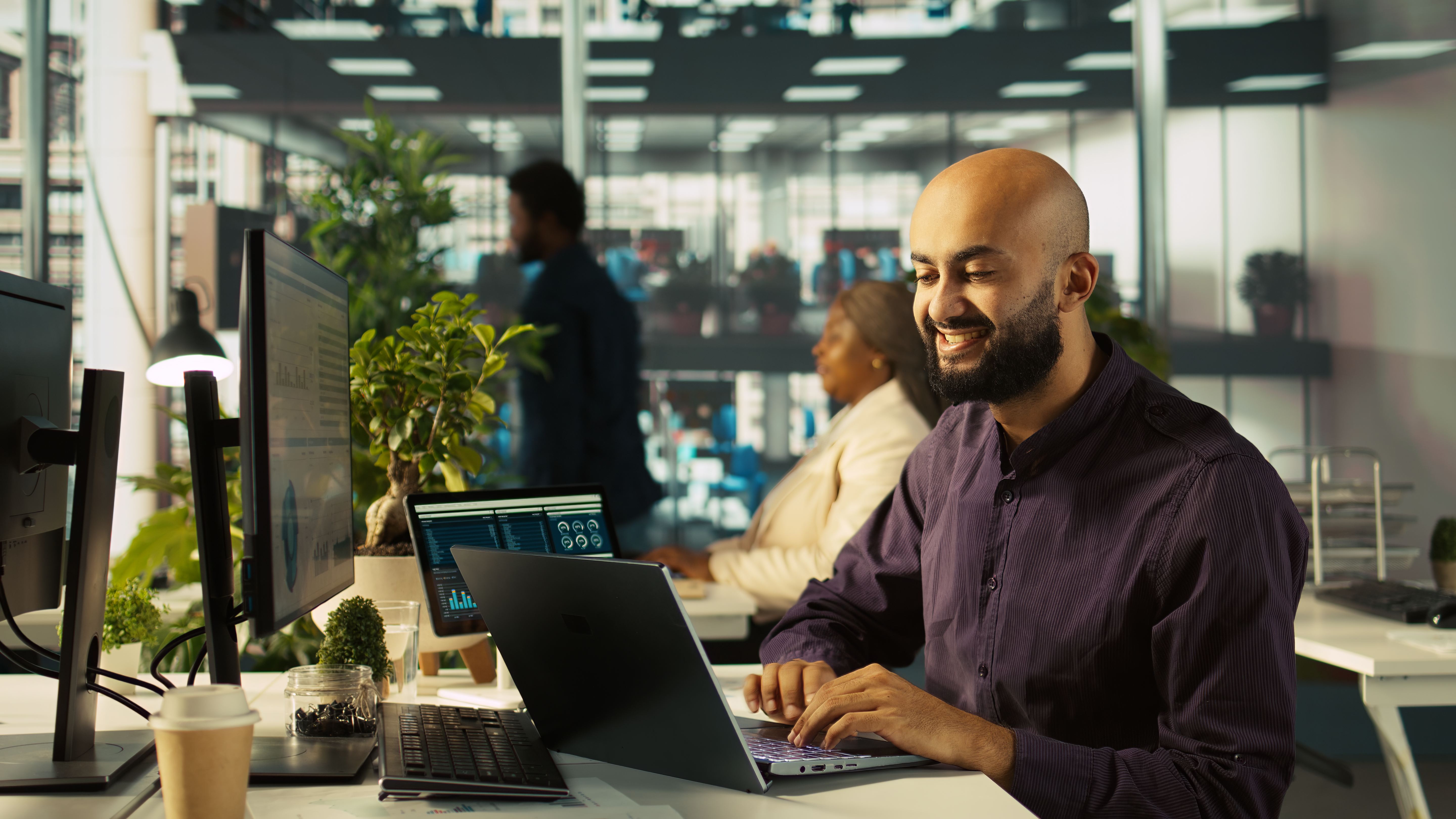 happy man working computer